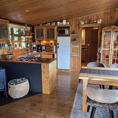 The wood stove provides cozy warmth