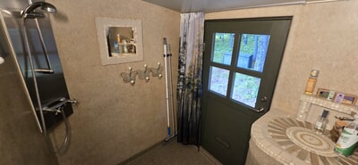 Bathroom with a door to the terrace
