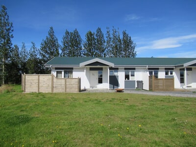 The apartment is at the end of the complex