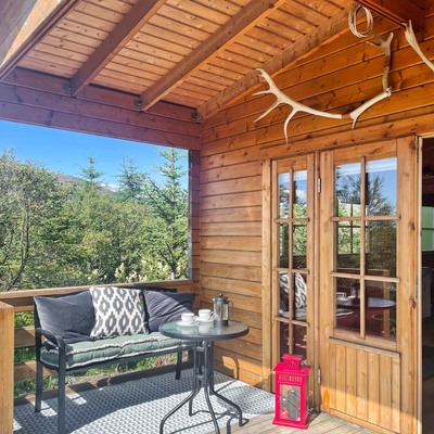 On the terrace, garden furniture invites you to relax