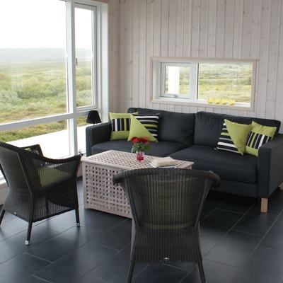 Modern living room with windows in all directions to enjoy the view