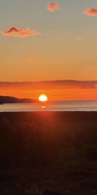 A beautiful sunset viewed from the terrace of the cottage