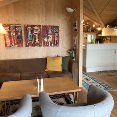 Open kitchen and cosy living room with couch