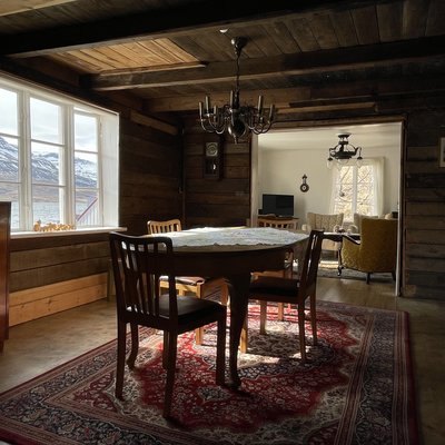 Dark wood paneled dining area