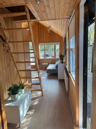 A steep staircase leads to the attic