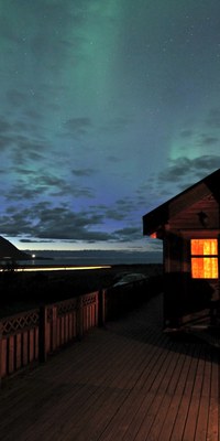 When the nights get colder, you can see the Northern Lights dancing across the sky from the cottage