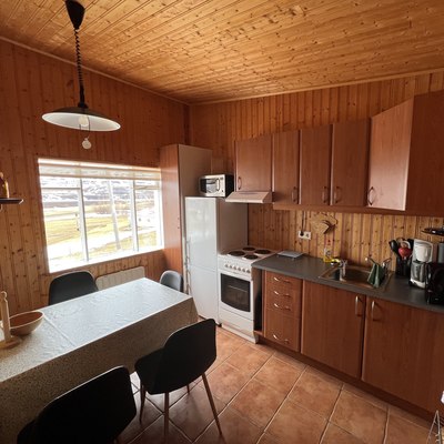 The kitchen with stove, refrigerator and everything needed for cooking