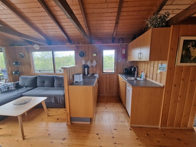 The well-equipped kitchen and the open dining area