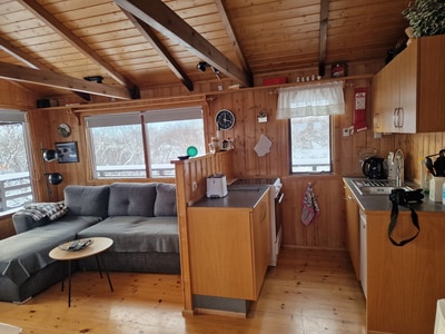 The well-equipped kitchen and the open dining area