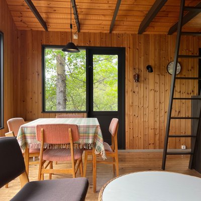 Dining table and steps up to the attic