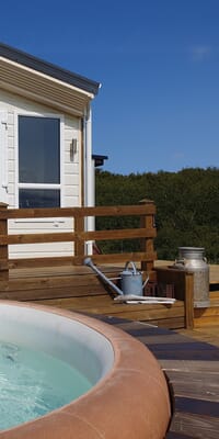 Hot tub by the house